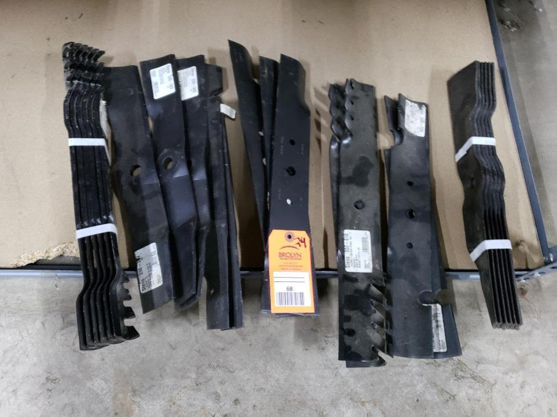 Qty 24 - Assorted mower blades. New old stock.