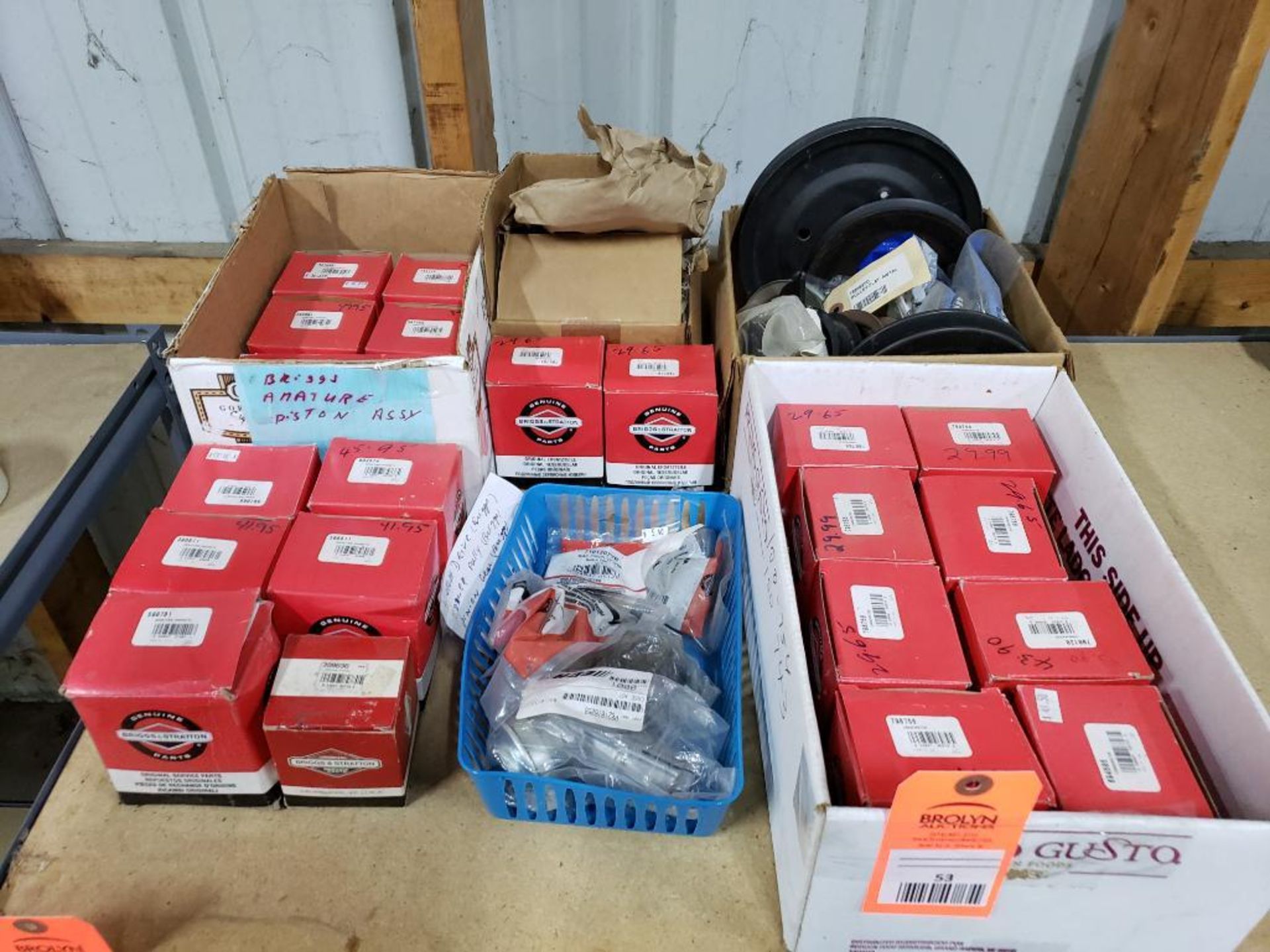 Large assortment of lawnmower and small engine repair parts. New as pictured.