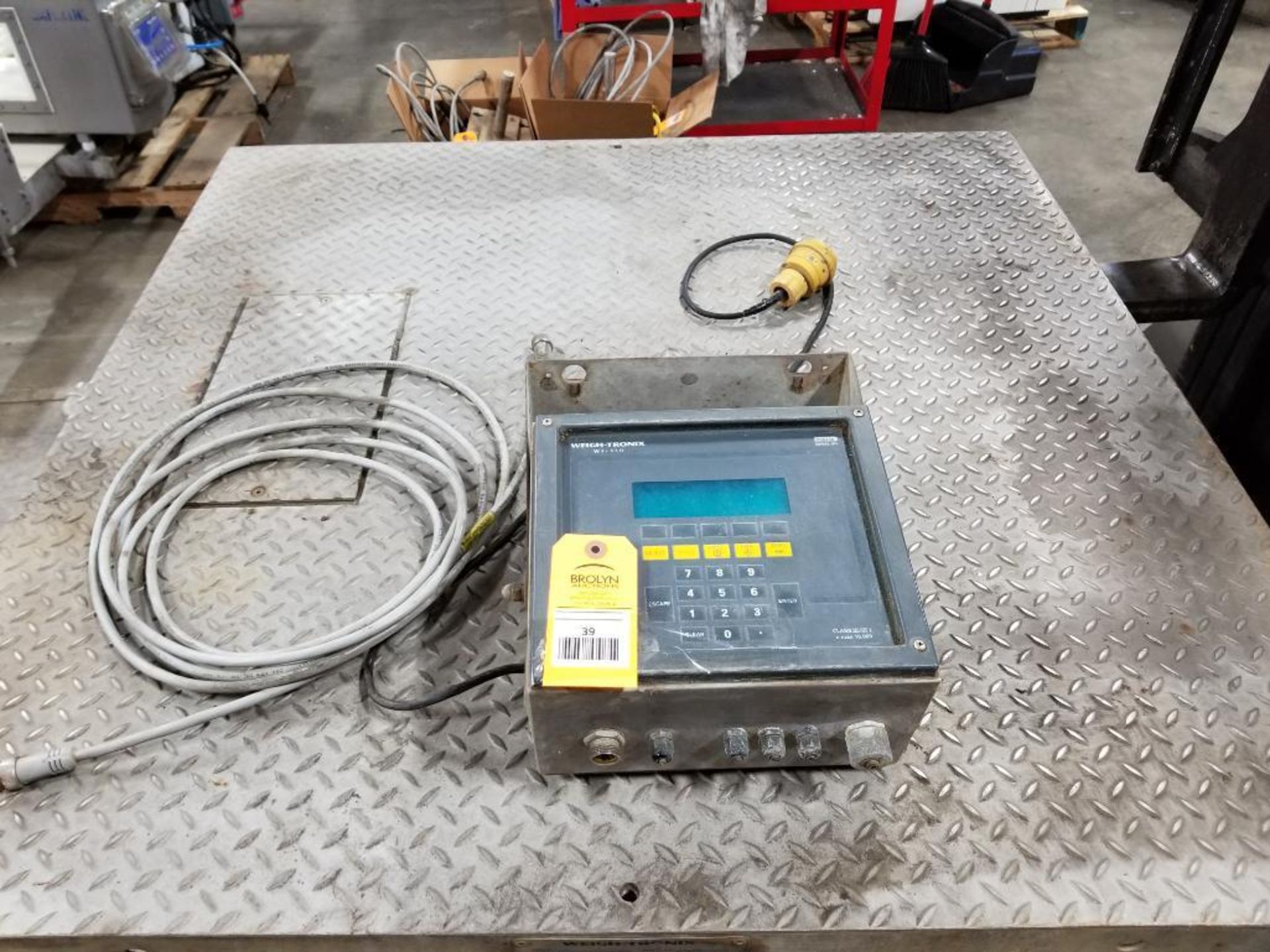 5000lb Weightronix platform scale. 48" x 48". 115v single phase. Tested and functional as pictured.