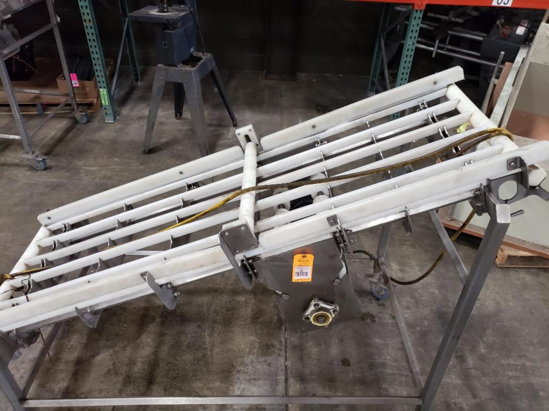 Food grade wash down incline power conveyor. 76" long x 26" wide.