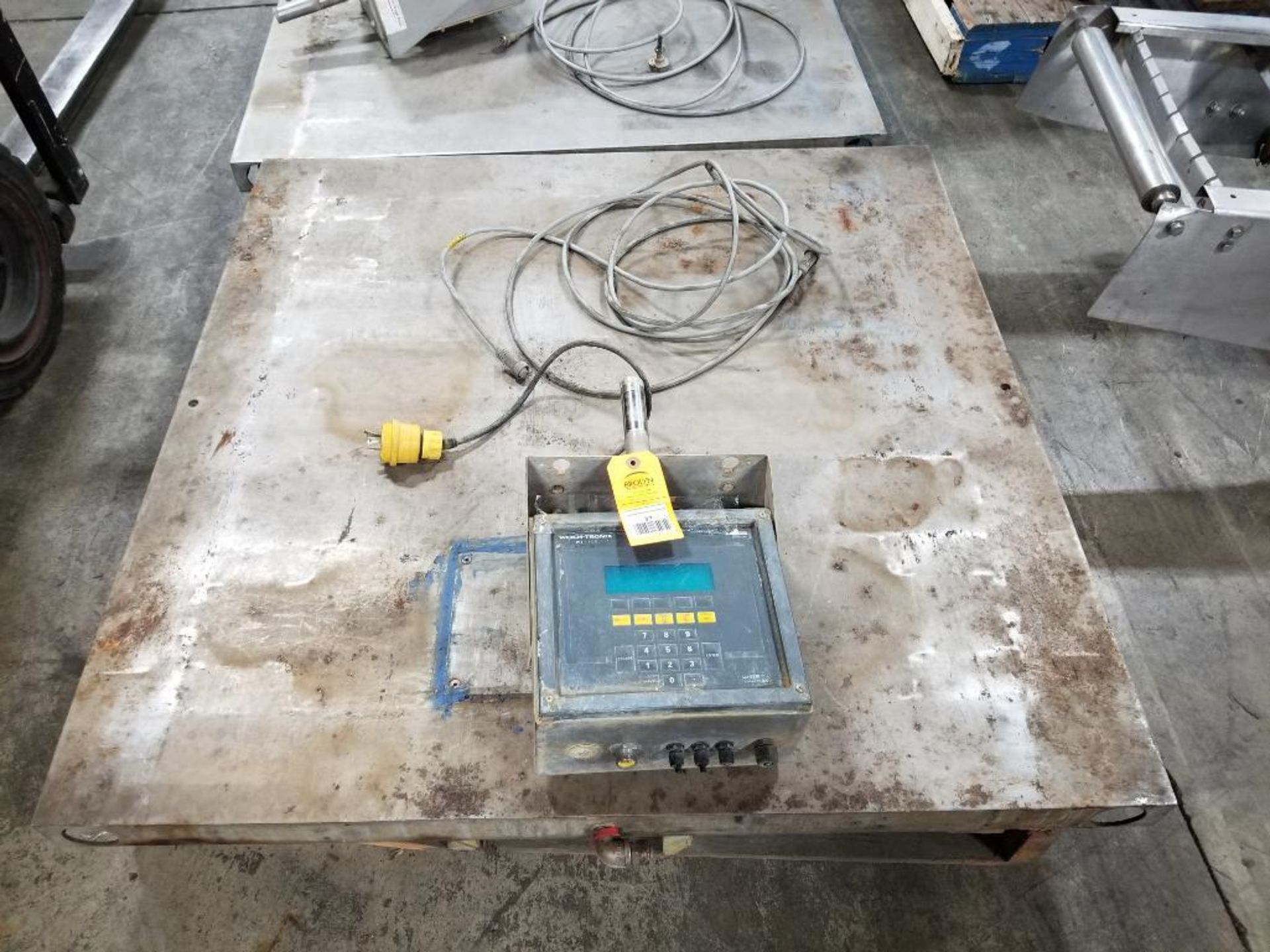 5000lb Weightronix platform scale. 48" x 48". 115v single phase. Tested and functional as pictured.