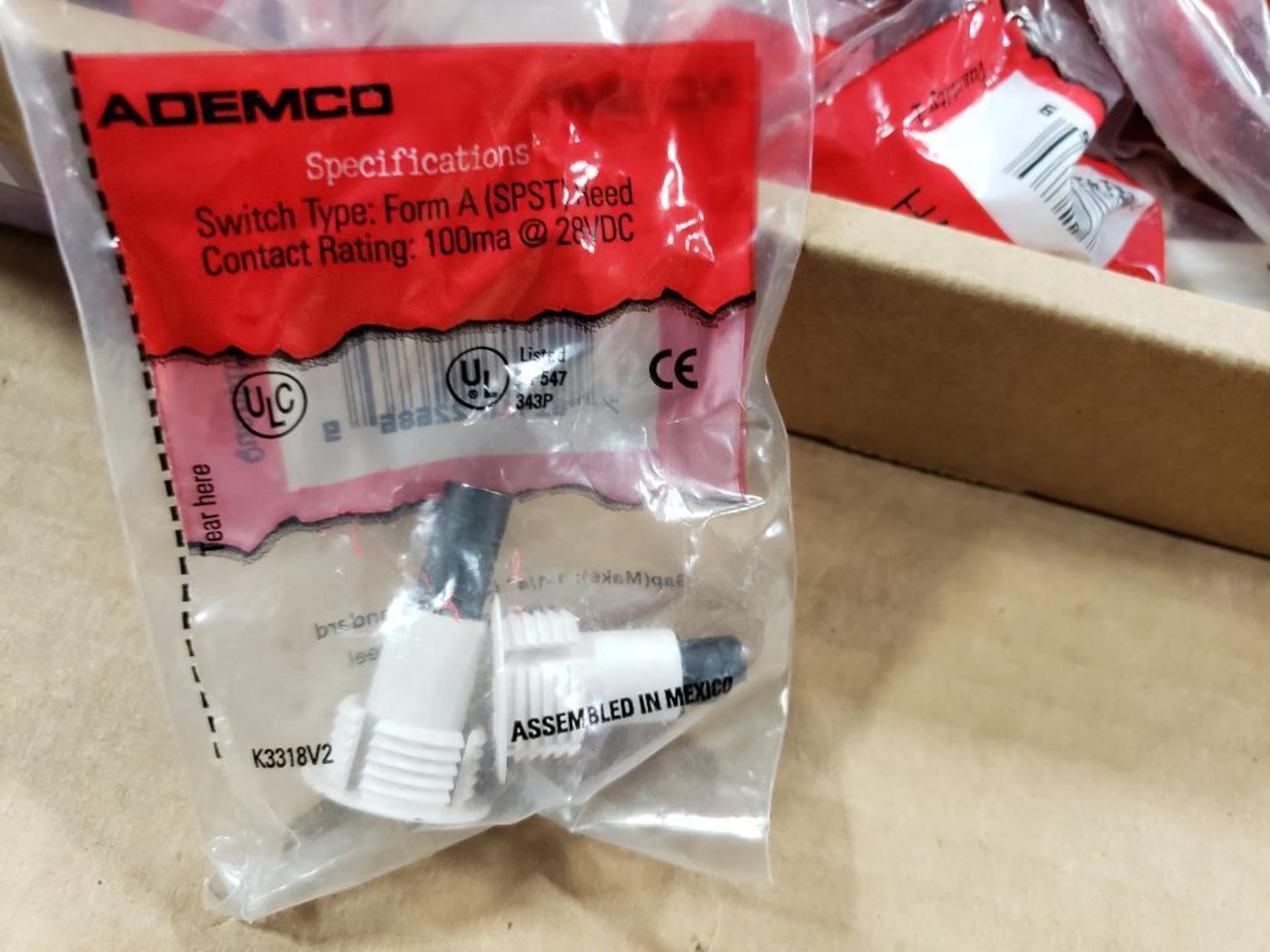 Large assortment of Ademco switches. New in package. - Image 2 of 4