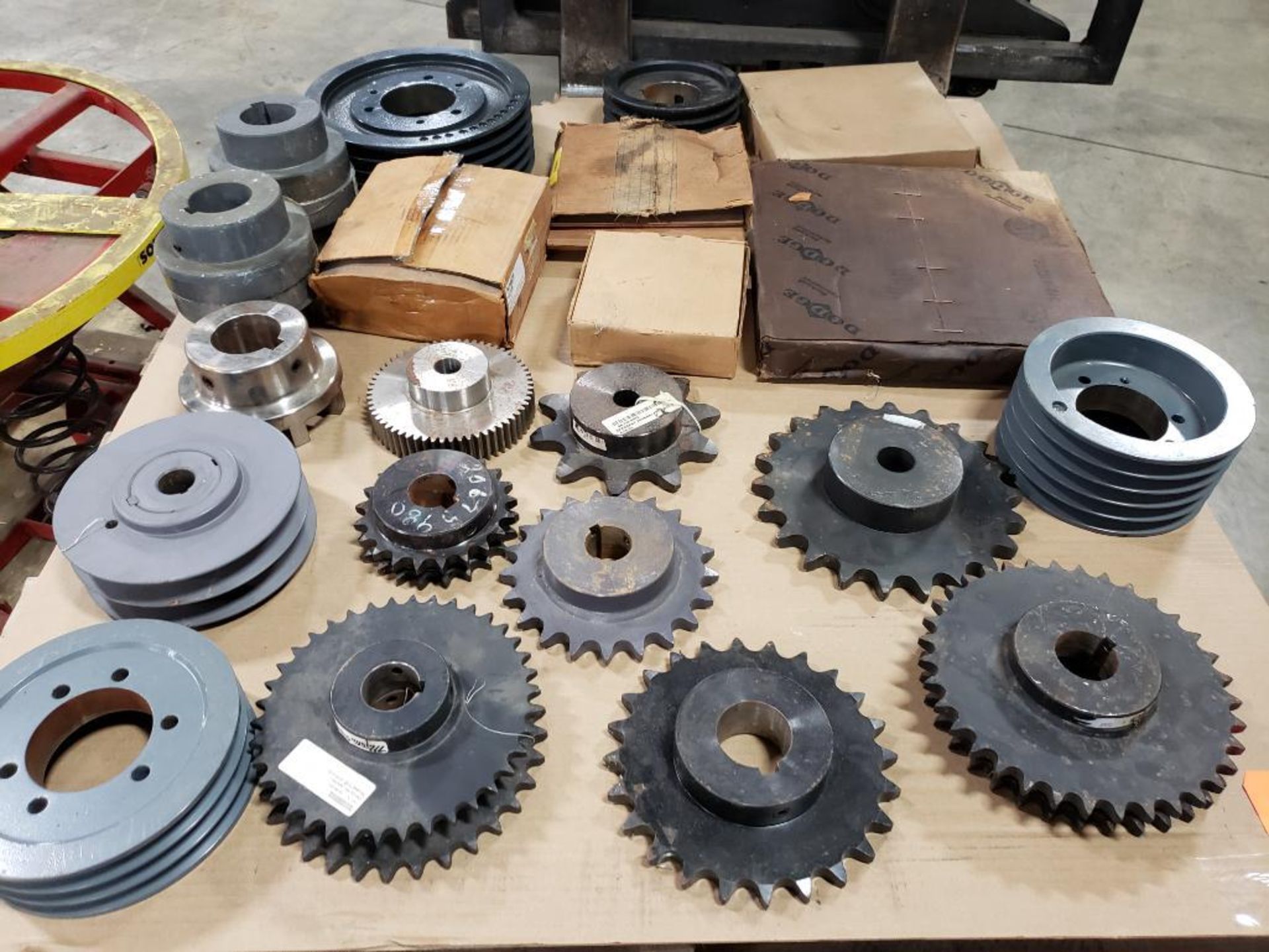 Pallet of assorted gears, sheave, pulley, coupling. Martin, Tsubaki, Atra-Flex.