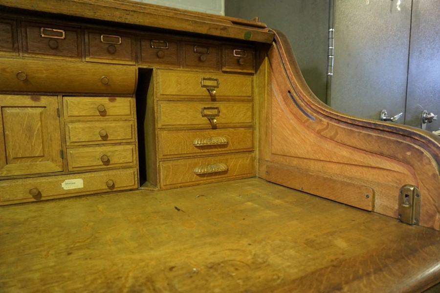 Oak Roll Top Desk, Having a Tambour Roller Shutter enclosing fitted Drawers and Pigeon Holes, Raised - Image 8 of 9