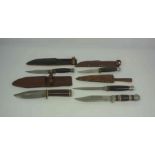 Four Vintage Military Style Hunting Knives / Daggers, Two examples stamped made in Sheffield, Blades