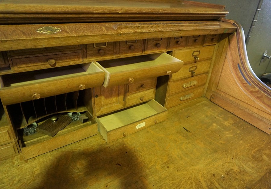 Oak Roll Top Desk, Having a Tambour Roller Shutter enclosing fitted Drawers and Pigeon Holes, Raised - Image 9 of 9