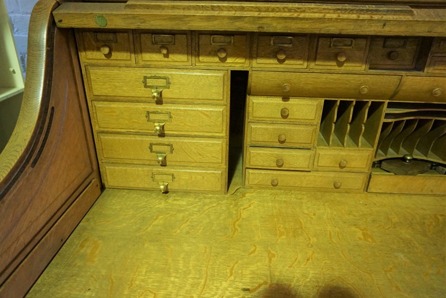 Oak Roll Top Desk, Having a Tambour Roller Shutter enclosing fitted Drawers and Pigeon Holes, Raised - Image 6 of 9