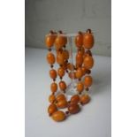 String of Antique Butterscotch Natural Amber Beads, 36 Beads in total, Gross weight Approximately 77