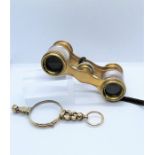 Pair of Opera Glasses, 5cm high, 9cm wide, With a Yellow Metal Lorgnette, (2)