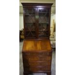 Reproduction Bureau Bookcase, Having two Glazed Astragal Doors above a Fall Front and four Graduated