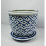 Chinese Blue and White Pottery Jardiniere on Stand, 20th century, 24cm high, 29cm wide