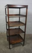 Mahogany What Not, circa 19th century, Having four open tiers, Raised on Brass castors, 112cm