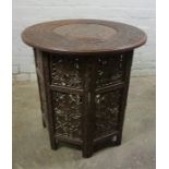 Burmese style Hardwood Folding Octagonal Table, Having a circular Brass inlaid top, 82cm high,