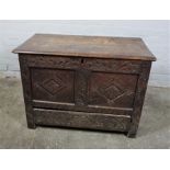 Oak Coffer, circa 18th century, Having a Hinged top, Decorated with carved panels above a Drawer,