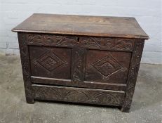 Oak Coffer, circa 18th century, Having a Hinged top, Decorated with carved panels above a Drawer,