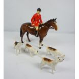 Beswick Porcelain Hunting Group, Comprising of a Horse and Rider with four Hounds, Horse and rider