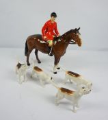 Beswick Porcelain Hunting Group, Comprising of a Horse and Rider with four Hounds, Horse and rider