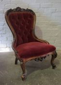 Mahogany Gossip Chair, Upholstered in a Buttonback red Dralon, 93cm high