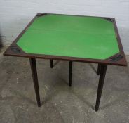 Mahogany Card Table, The fold over top enclosing a later green felt interior, The table extends on