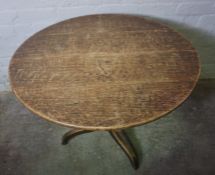 Oak Supper Table, circa 18th century, Having a tilt circular top, 89cm high, 80cm wide