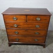 George III Mahogany Inlaid Chest of Drawers, circa early 19th century, Having two small Drawers