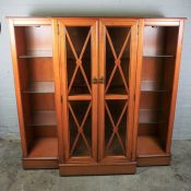 Modern Cherrywood DIsplay Cabinet, Having two glazed Doors enclosing glass shelves, Flanked with