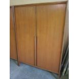 Two Retro Teak Wardrobes by Younger Ltd, Largest 180cm high, 122cm wide, 44cm deep, (2)