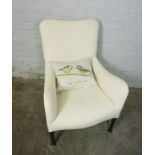 Vintage Armchair, Raised on Brass castors, 86cm high