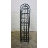 Gothic style Wine Rack, Having a door enclosing 36 open Bottle inserts, 131cm high, 30cm wide,