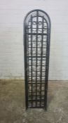 Gothic style Wine Rack, Having a door enclosing 36 open Bottle inserts, 131cm high, 30cm wide,