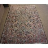 Persian Hand Knotted Rug, Decorated with allover Floral panels on a red, white and blue ground,