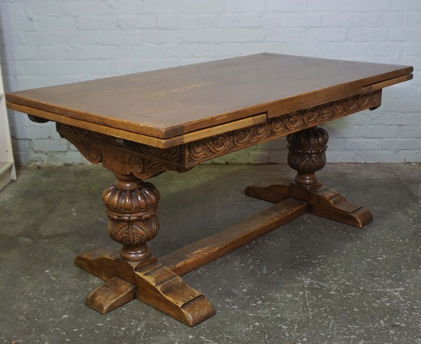 Oak Draw Leaf Dining Table, circa 1930s, Raised on Pineapple supports, 76cm high, 245cm long, 85cm