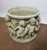 Composite Stone Garden Jardiniere, Decorated with allover Putti, 33cm high, 37cm wide, Matches lot
