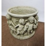 Composite Stone Garden Jardiniere, Decorated with allover Putti, 33cm high, 37cm wide, Matches lot