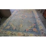 Chinese Carpet, Decorated with Floral panels on a blue ground, 385cm x 273cm
