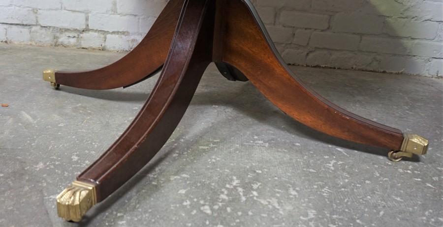 Modern Mahogany Pedestal Table, Having a circular top, Raised on quadrapartite supports with brass - Image 3 of 3