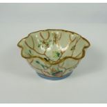 Chinese Pottery Bowl, Decorated with allover insects in foliage on a white ground, Reign marks to