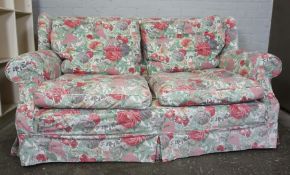 Fabric Two Seater Sofa, Having a Floral cover, 87cm high, 180cm wide