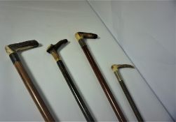 Three Antler Grip Walking Sticks (circa early 20th century) Having Silver Collars, With a Riding