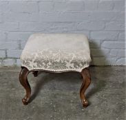 Victorian Walnut Footstool, Having a later Fabric top, Serpentine front, Raised on Sabre legs,