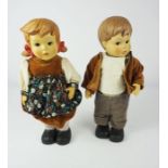 Pair of Bisque Dolls, Modelled as a Dutch Boy and Girl in Costume, Star and Arrow marks to back of