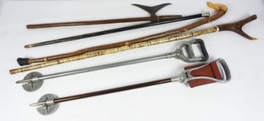 Five Assorted Walking Sticks / Shooting Sticks, To include a Silver Top and Antler Handled Walking