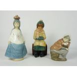 Nadal Glazed Pottery Figure, Modelled as a girl wearing a hat and scarve, With two Nao Figures of