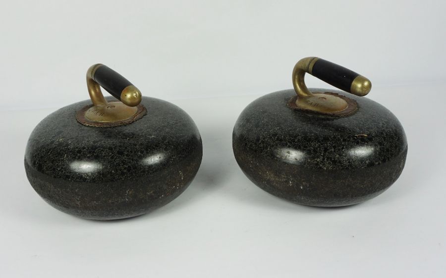 Pair of Curling Stones, circa early 20th century, Stamped B.A.H to the brass handles (2)