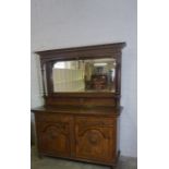 Oak Mirror Back Sideboard circa early 20th century, Having a mirrored section above two small