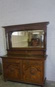 Oak Mirror Back Sideboard circa early 20th century, Having a mirrored section above two small