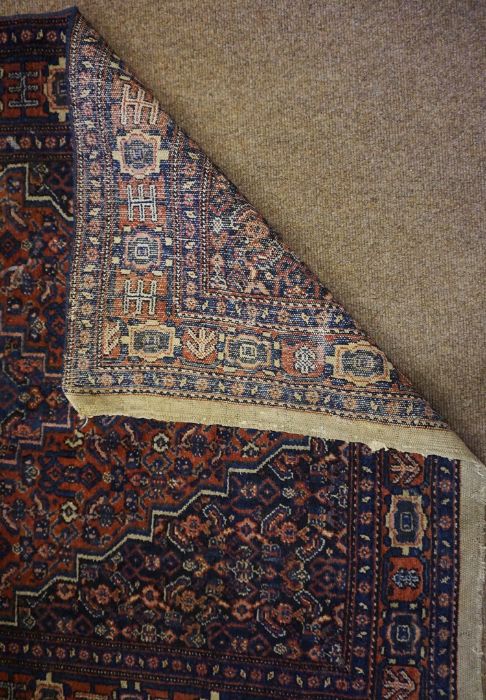 Two Persian Hand Knotted Rugs, On red and blue grounds, 150cm x 104xm, 190cm x 105cm (2) - Image 2 of 6