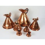 Set of Seven Copper Graduated Measuring Jugs, circa 19th century, Largest one gallon (7)Condition