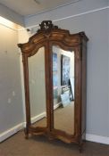 French Walnut Armoire, Having two mirrored Doors enclosing a shelved interior, 241cm high, 142cm