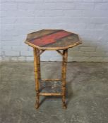 Japanese Bamboo Occasional Table (circa late 19th century) Having an Octagonal top above under tier,